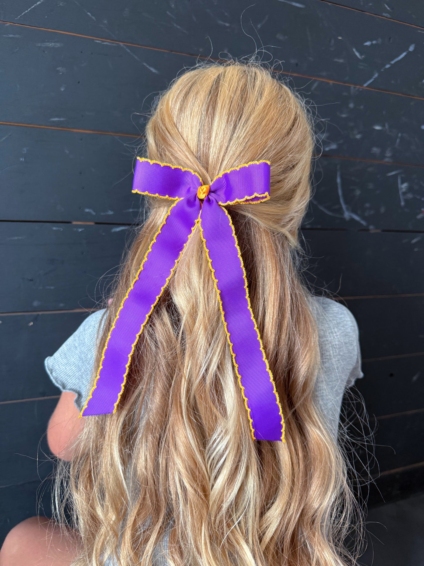 purple w yellow stitch xl bow